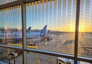 window view with airplanes on ground