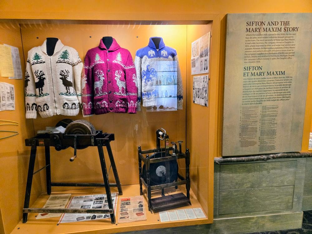 handmade sweaters in display case