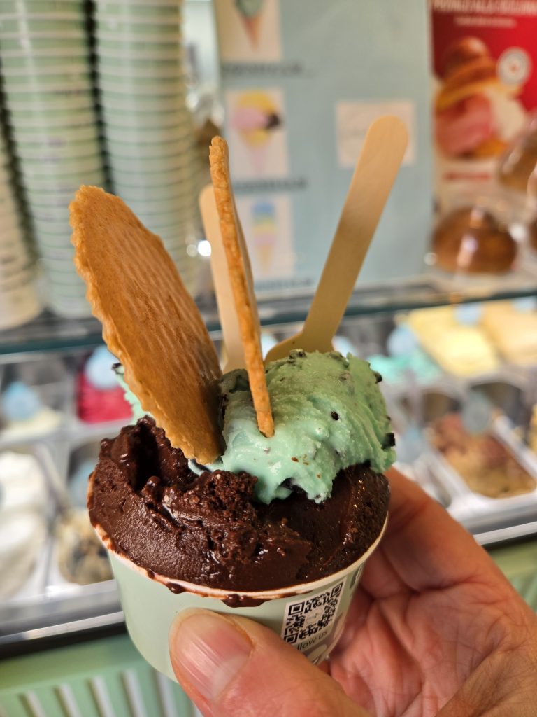 gelato in a cup with biscuits